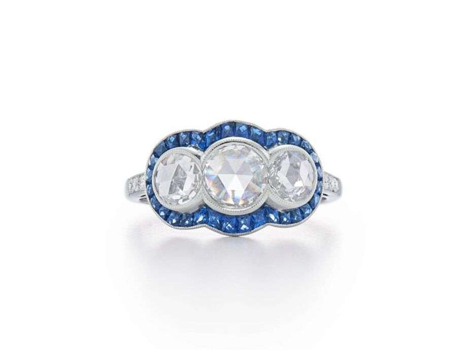 Halo of blue sapphires